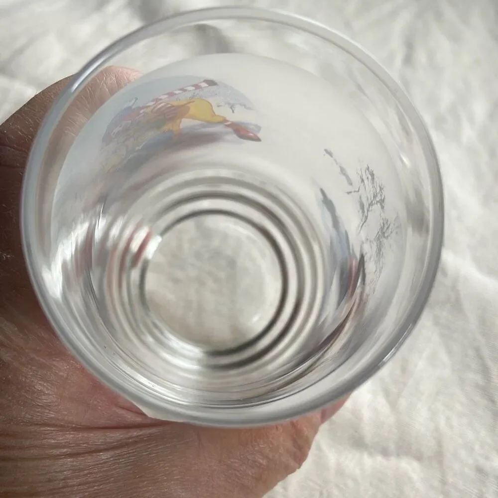 Vintage Ronald McDonald winter sled scene glass.